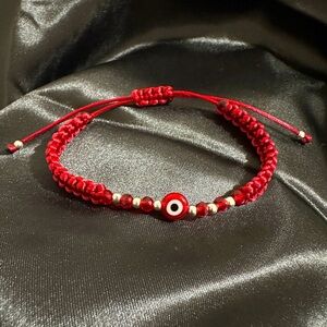 Red evil eye handmade thread bracelet